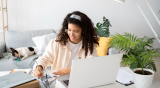 Person working remotely with a laptop